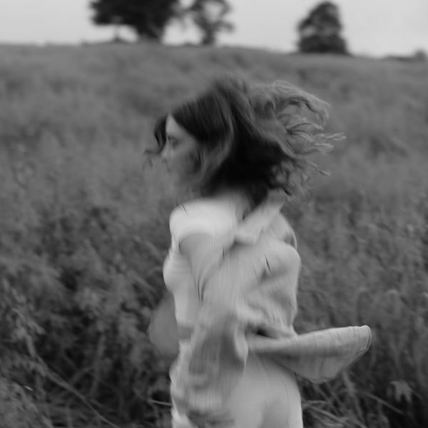 Blurry motion capture of a person running in place.